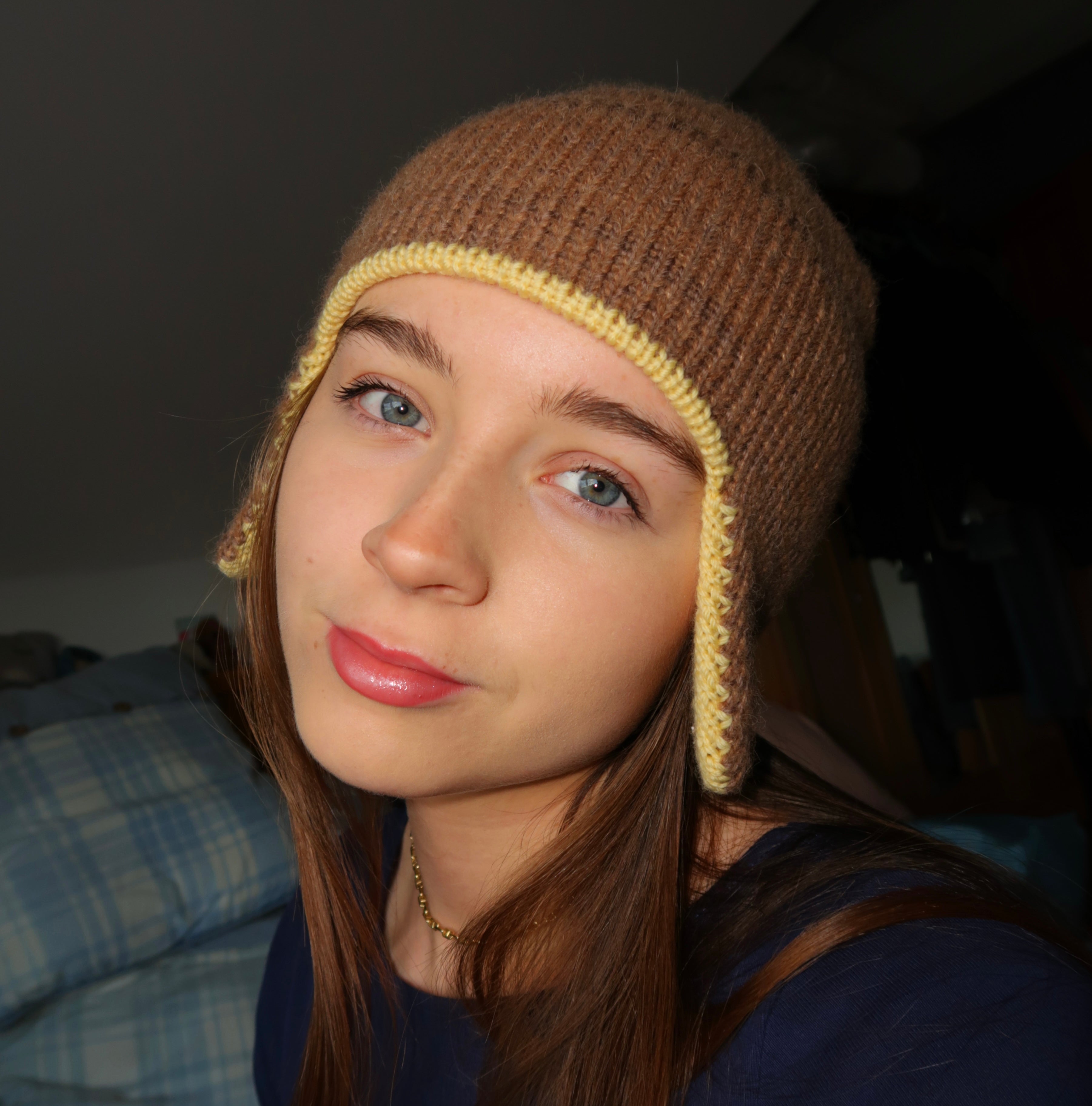 Brown and yellow earflap beanie