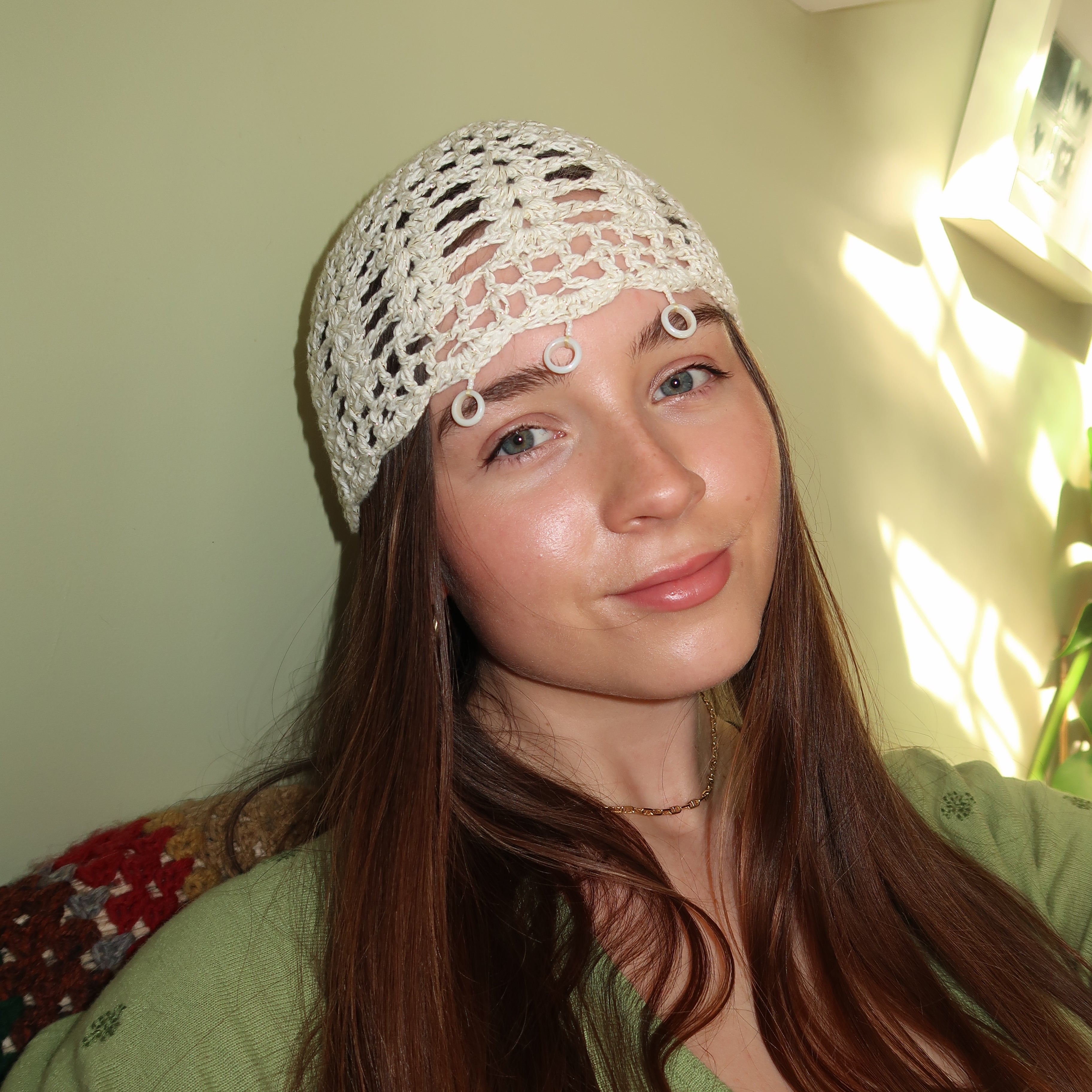 White and gold sparkly beaded crochet mesh hat