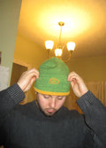 Reversible green and mustard swirl beanie