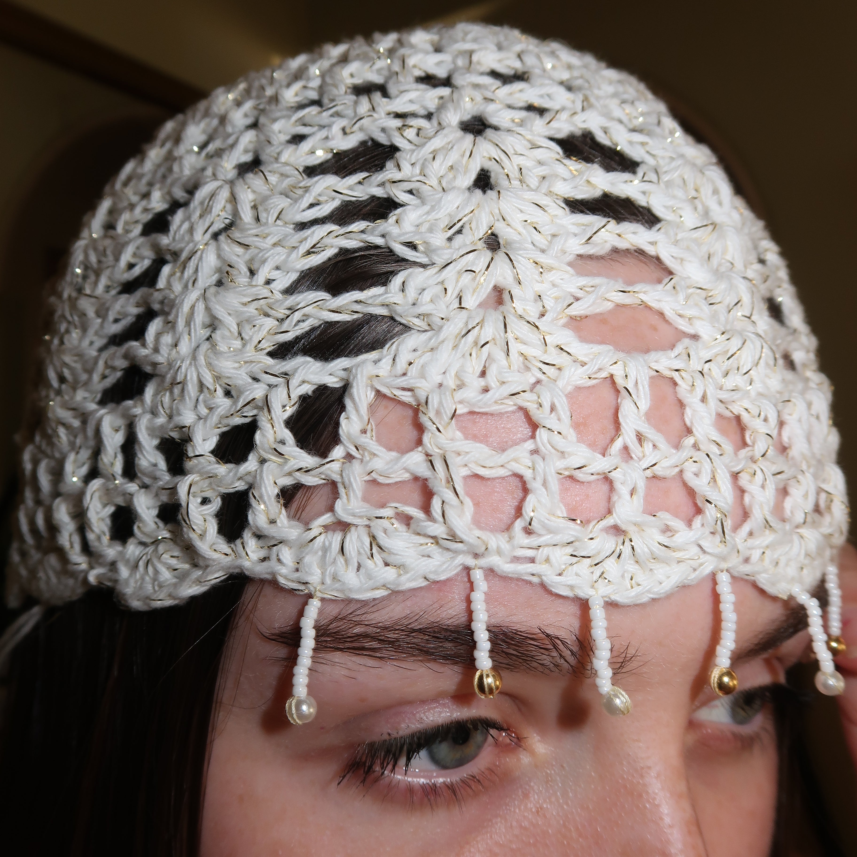White and gold beaded sparkly mesh hat