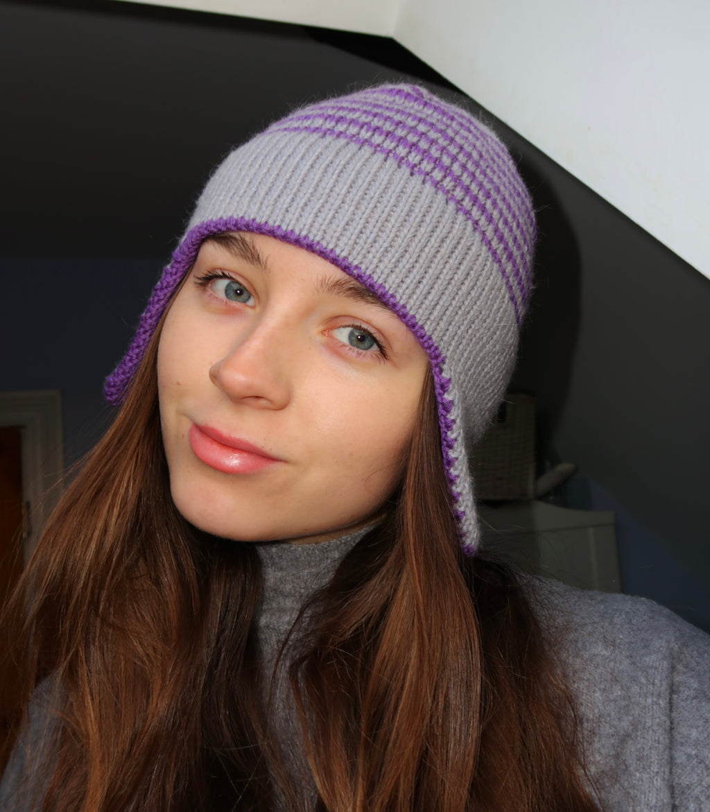Grey and purple striped earflap beanie