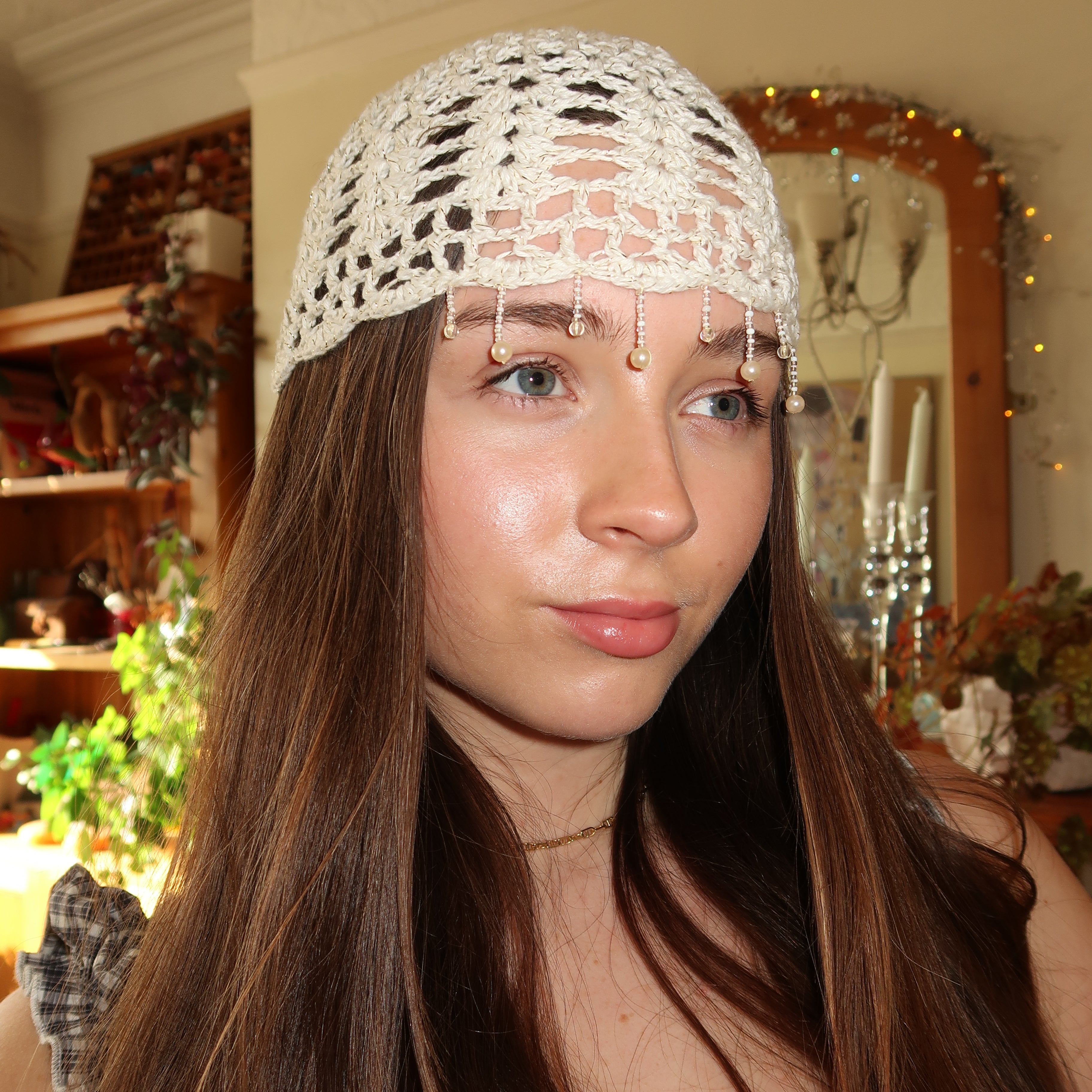 White and gold sparkly beaded crochet mesh hat