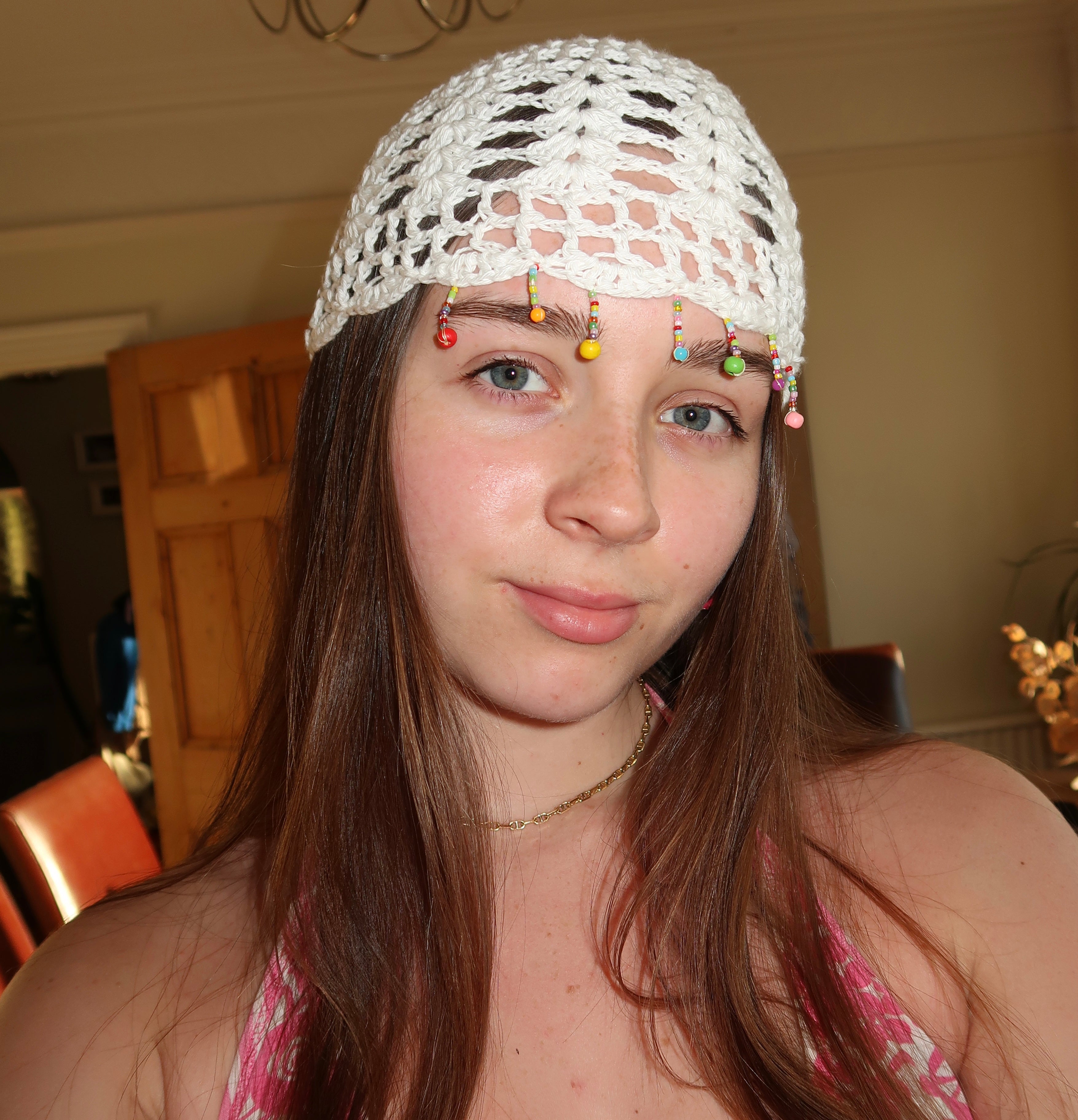 Crochet multicoloured beaded mesh hat